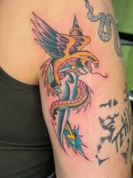 Traditional eagle and dagger tattoo